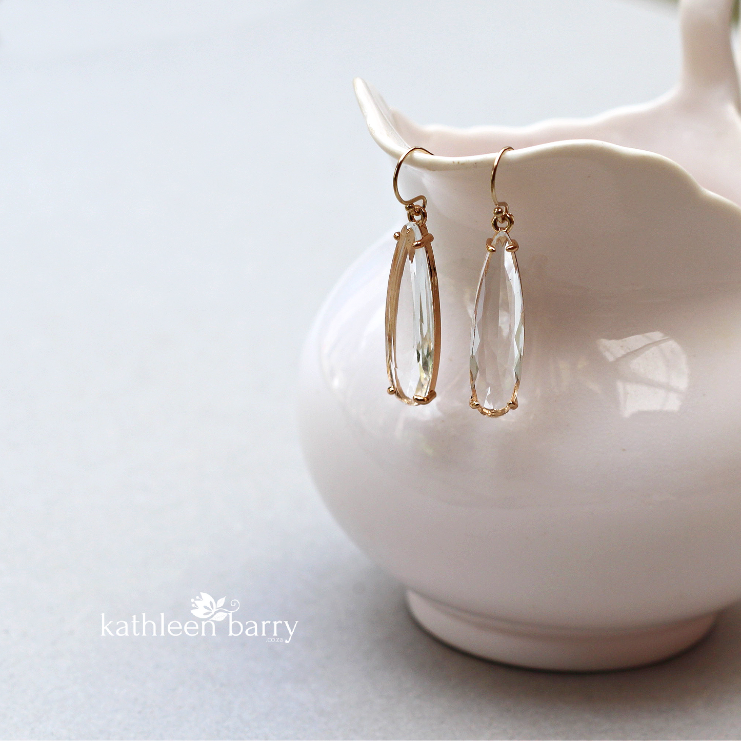 Kendra facetted clear drop gold earring - gold finish only