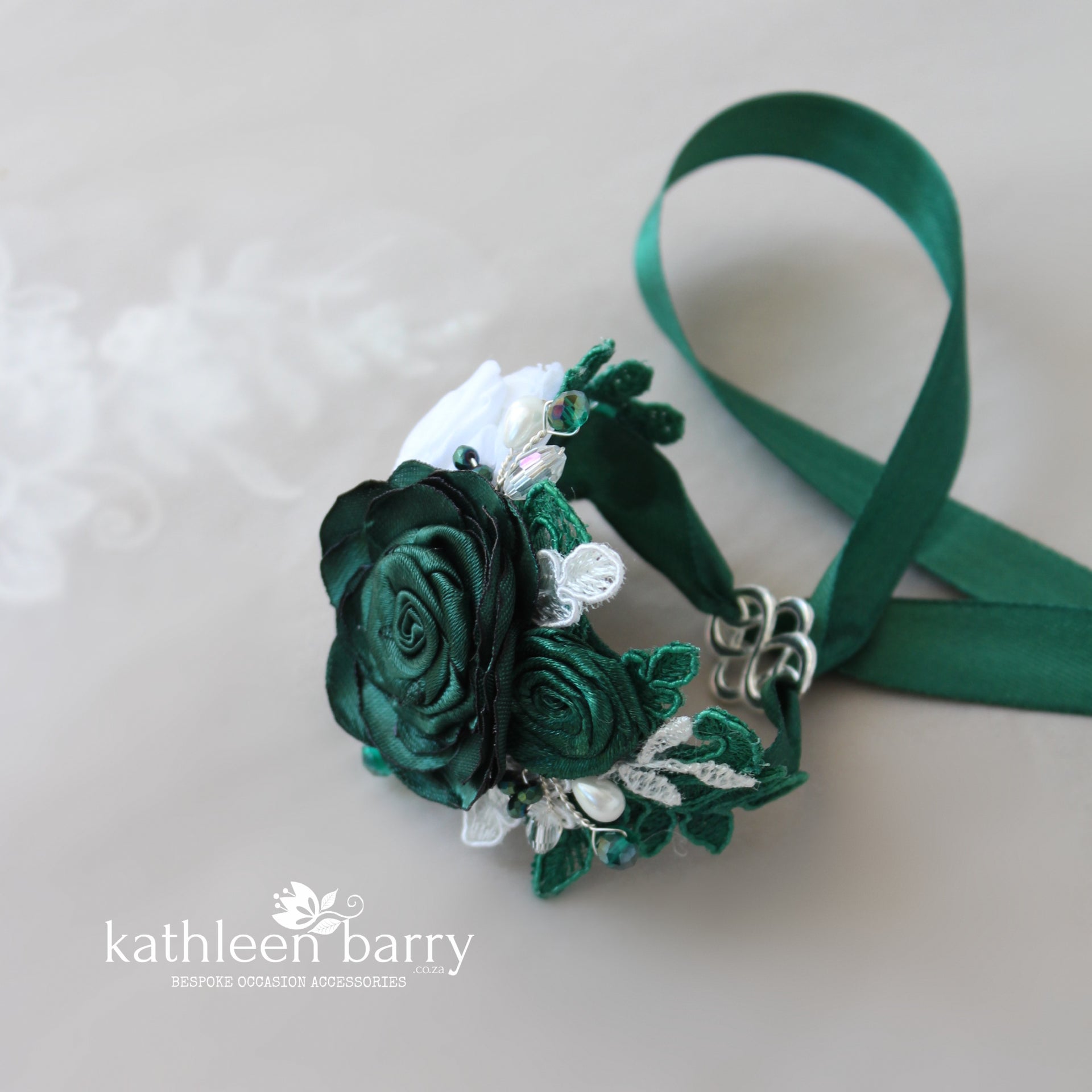wrist corsage for emerald green dress Erin Everlasting Lace making each set unique Why Glinda's Bubble Dress Color:Forest River finish-clay