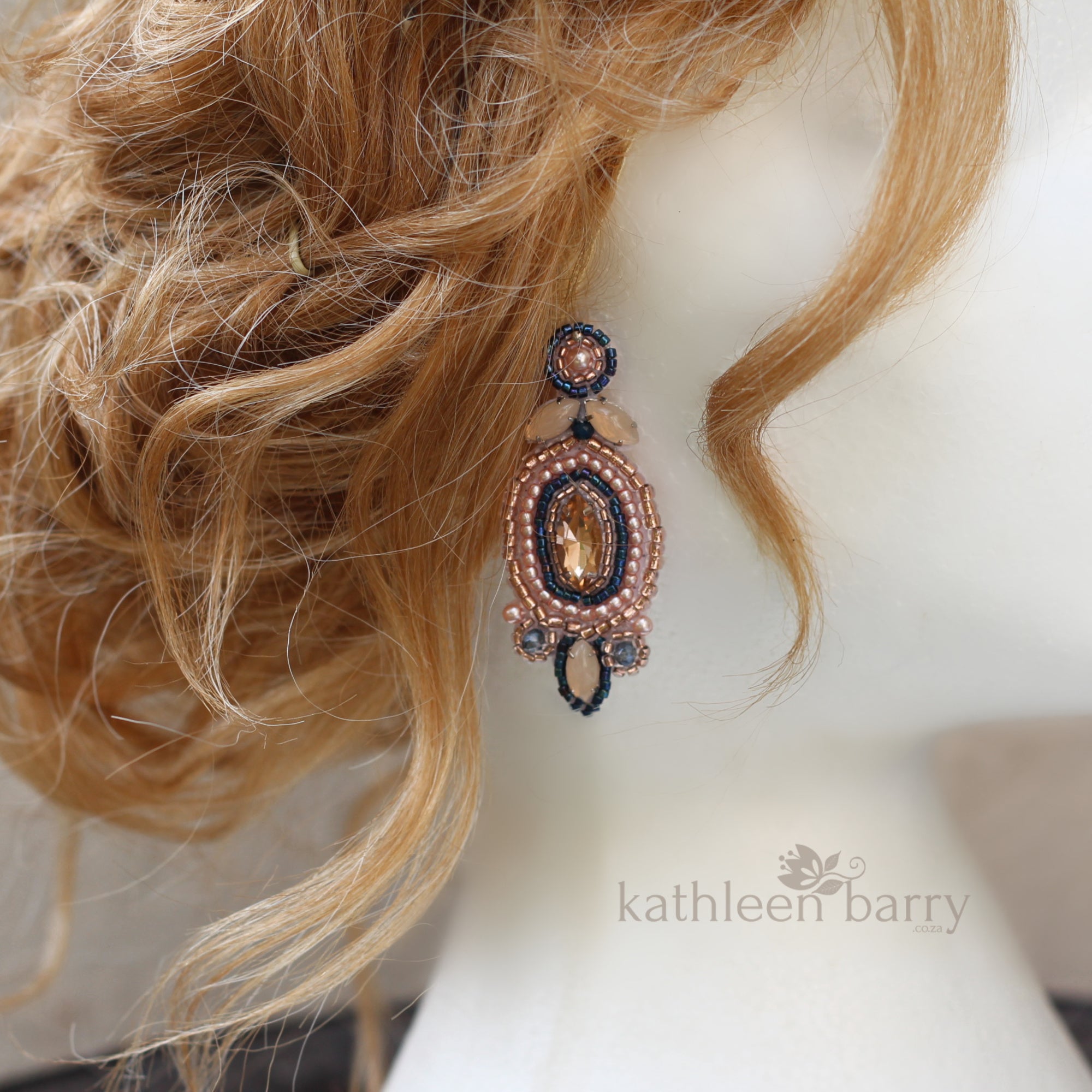 Navy blue shop and pink earrings