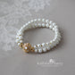 Ilke double strand pearl barecelet available in gold or rose gold 3 pearl color options