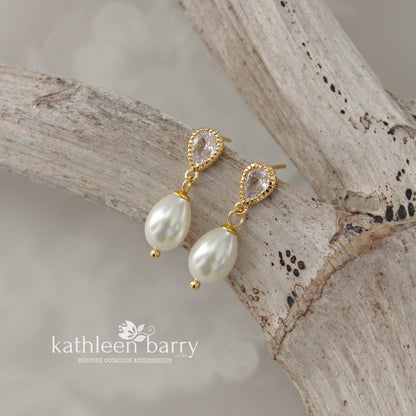 Dainty pearl drop cubic zirconia stud earrings available in Gold finish only (limited stock available)