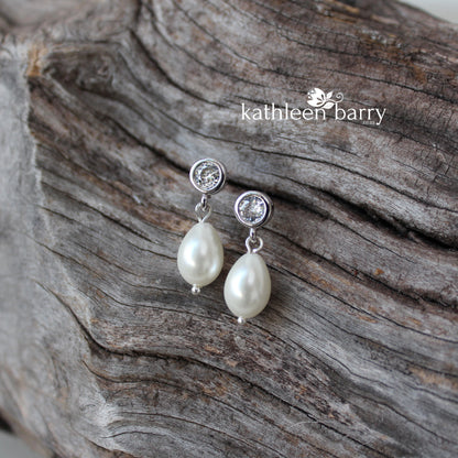 Simple pearl drop cubic zirconia stud earrings available in Silver finish only