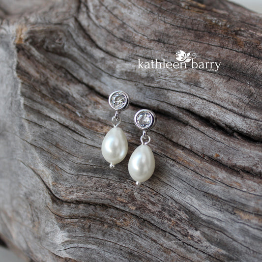 Simple pearl drop cubic zirconia stud earrings available in Silver finish only