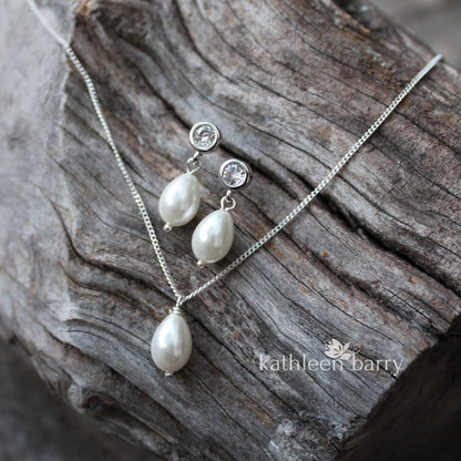 Simple pearl drop cubic zirconia stud earrings available in Silver finish only