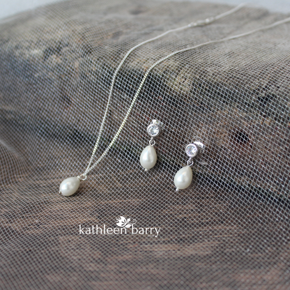 Simple pearl drop cubic zirconia stud earrings available in Silver finish only