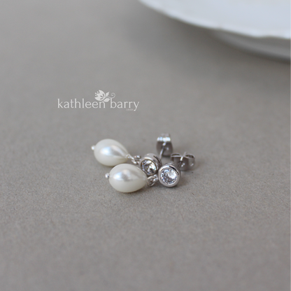 Simple pearl drop cubic zirconia stud earrings available in Silver finish only