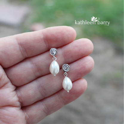 Simple pearl drop cubic zirconia stud earrings available in Silver finish only